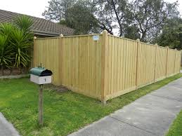 Lapped timber fence with Capping