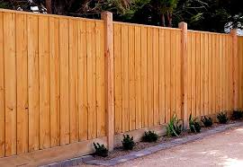 Exposed capped timber fence